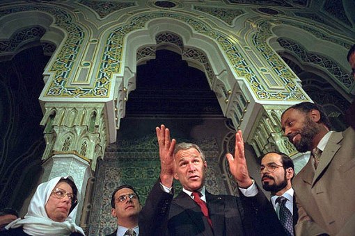 Nihad Awad (second from right) stands to President Bush's left, when Bush said "Like the good folks standing with me, the American people were appalled and outraged at last Tuesday's attacks [on Sept. 11, 2001].