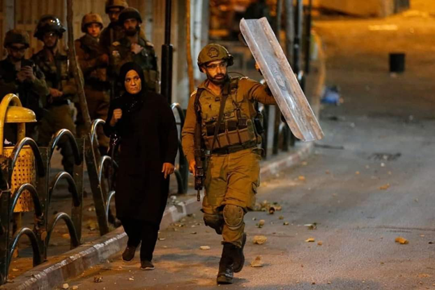 Idf shields Muslim woman